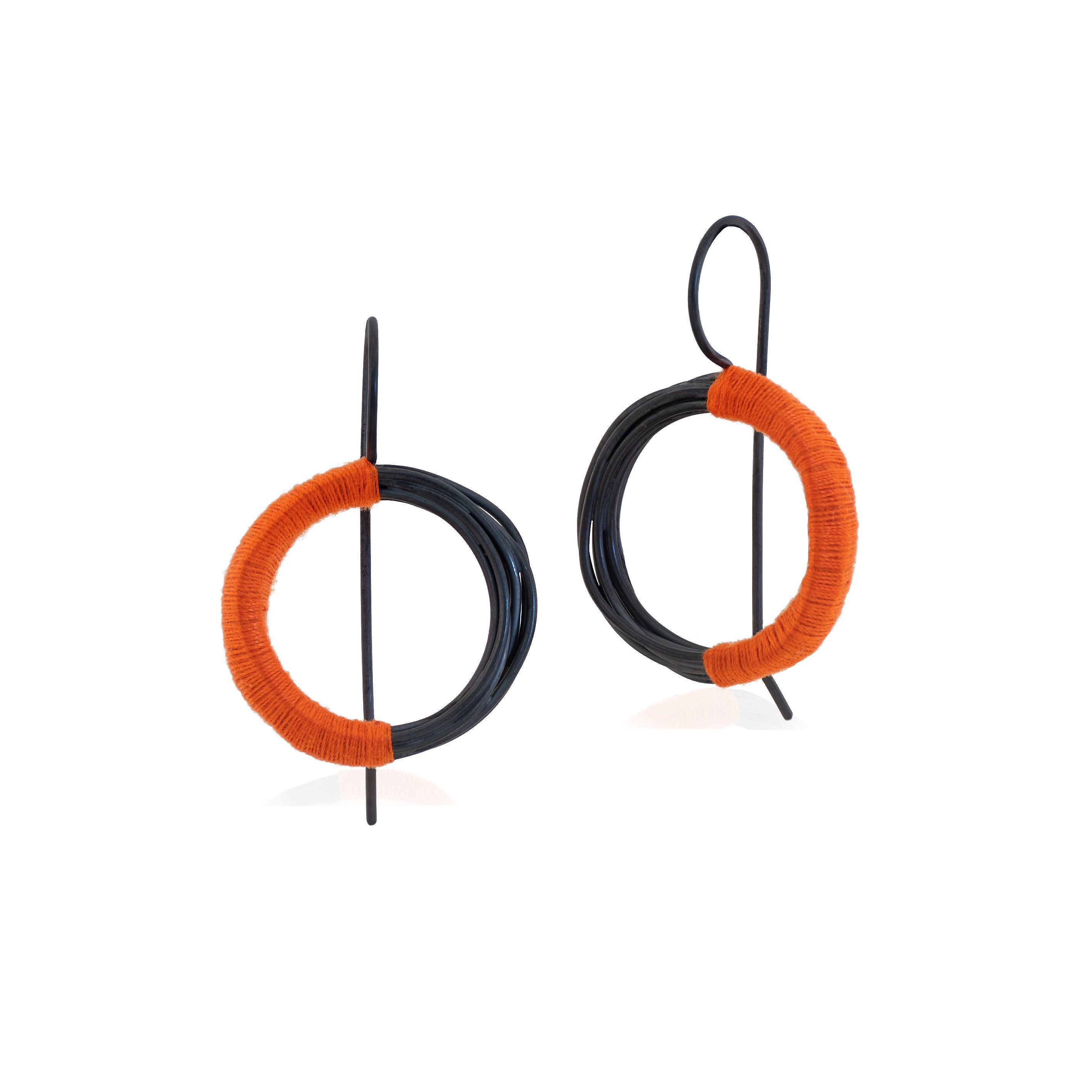 Large Circular Coiled wire Hook Earrings in Oxidized Sterling Silver and wrapped with orange cotton thread handmade in Adelaide, South Australia by Melissa Gillespie Jewellery