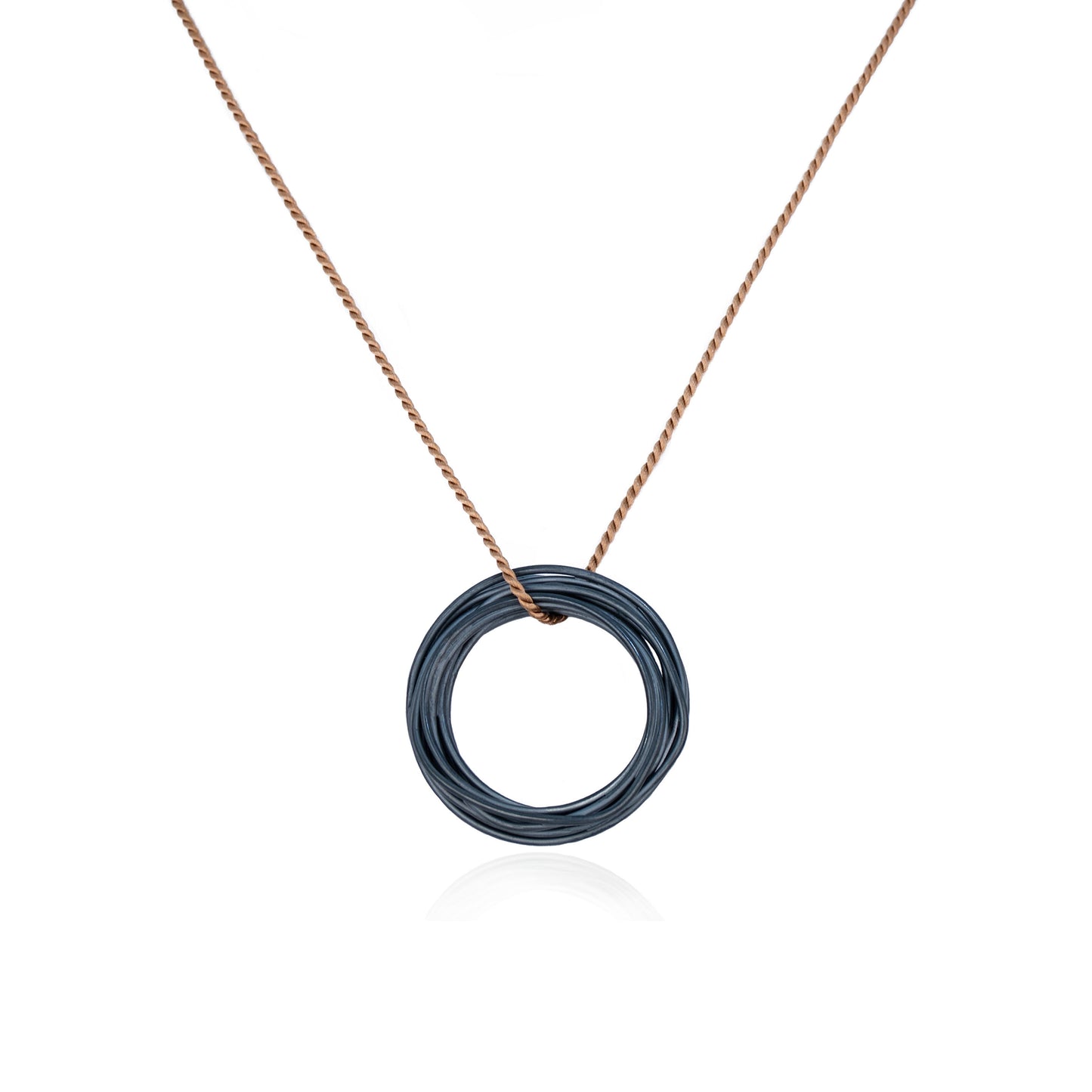 Oxidized Continuous Circle Pendant on Brown Silk Cord features a coiled wire pendant in Oxidized Sterling Silver, handmade in Adelaide, South Australia by Melissa Gillespie Jewellery