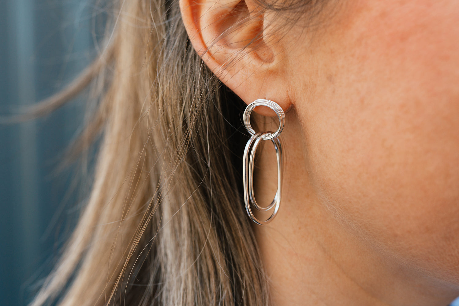Melissa Gillespie Jewellery wearing a pair of Sterling Silver Stud Dangle Earrings Contemporary in style, handmade from her studio in Adelaide, South Australia