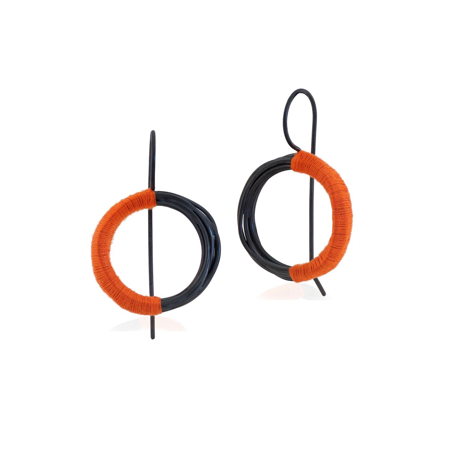 Large Circular Coiled wire Hook Earrings in Oxidized Sterling Silver wrapped with orange cotton thread, handmade in Adelaide, South Australia by Melissa Gillespie Jewellery