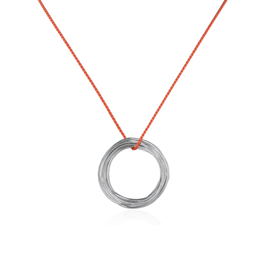 Continuous Circle Pendant on Orange Silk Cord features a coiled wire pendant in Sterling Silver, handmade in Adelaide, South Australia by Melissa Gillespie 