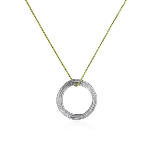 Continuous Circle Pendant on Green Silk Cord features a coiled wire pendant in Sterling Silver, handmade in Adelaide, South Australia by Melissa Gillespie 